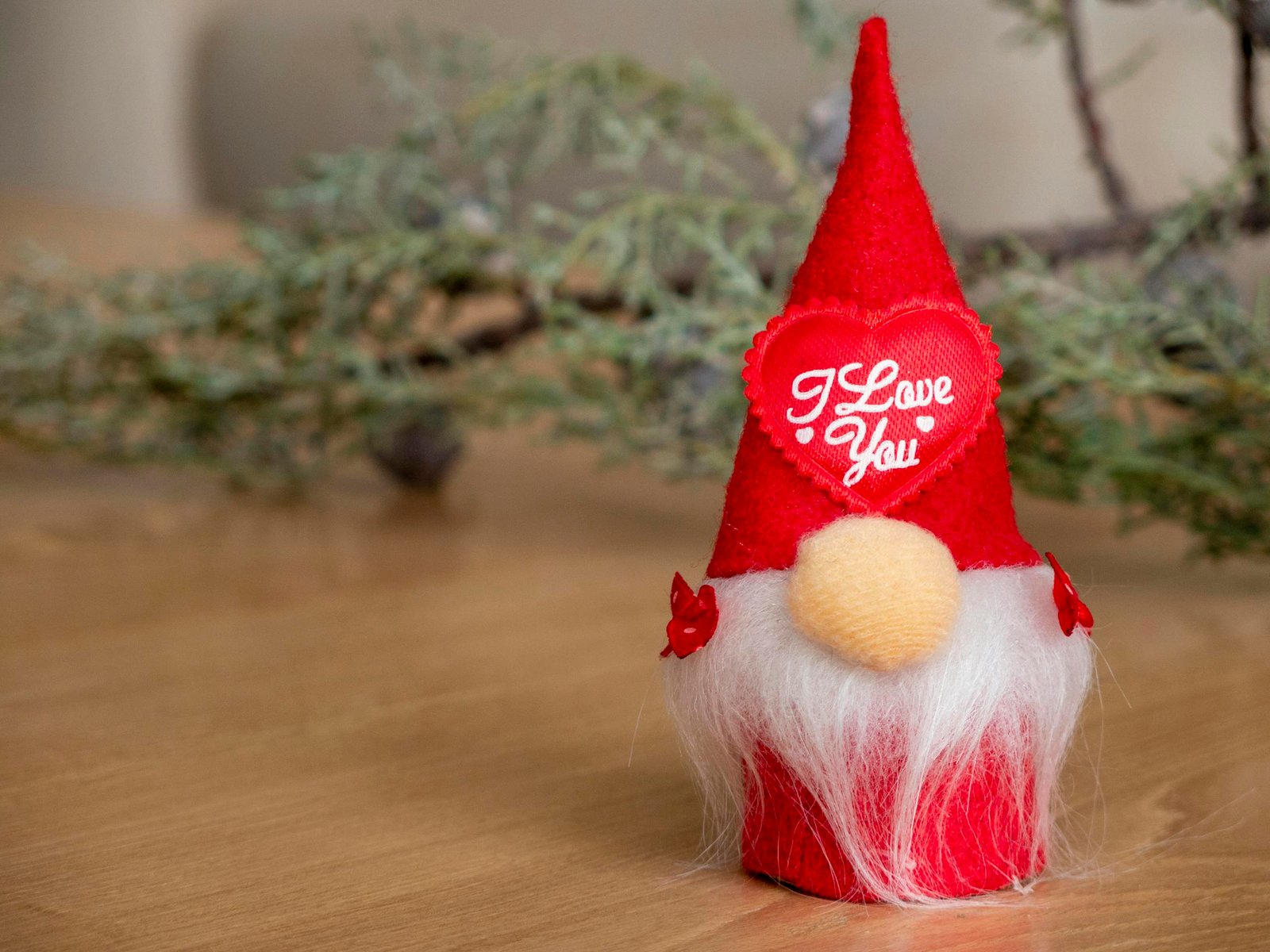 Adorable red gnome with 'I Love You' text, perfect for holiday decoration.